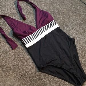 Never worn One piece, full butt swim suit